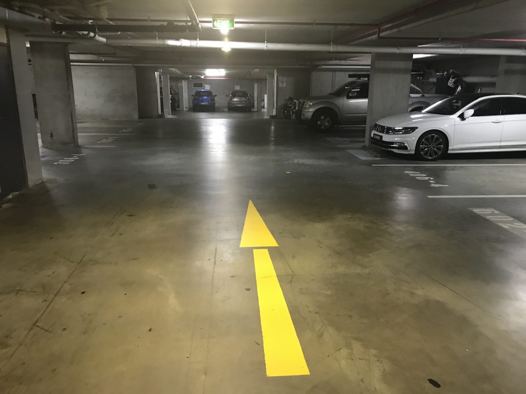 Turn left and head towards the southern wired fence