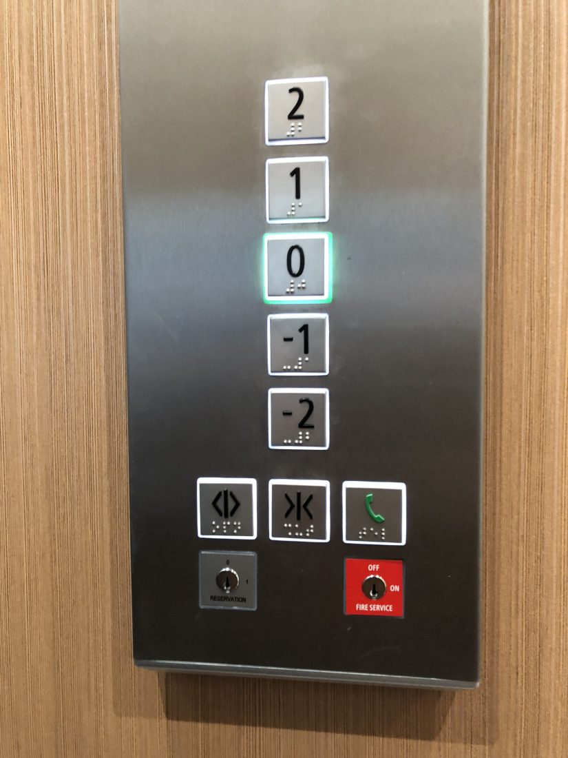 Enter the lift and press floor 1